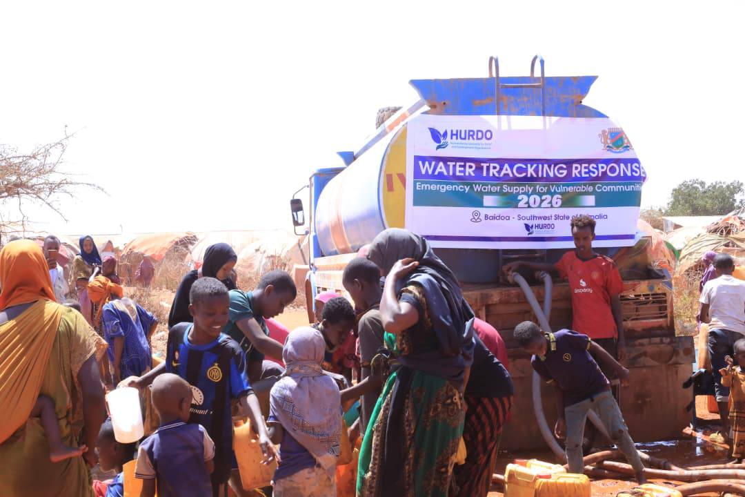 Community members collecting water from a HURDO water trucking response in Baidoa, Southwest State