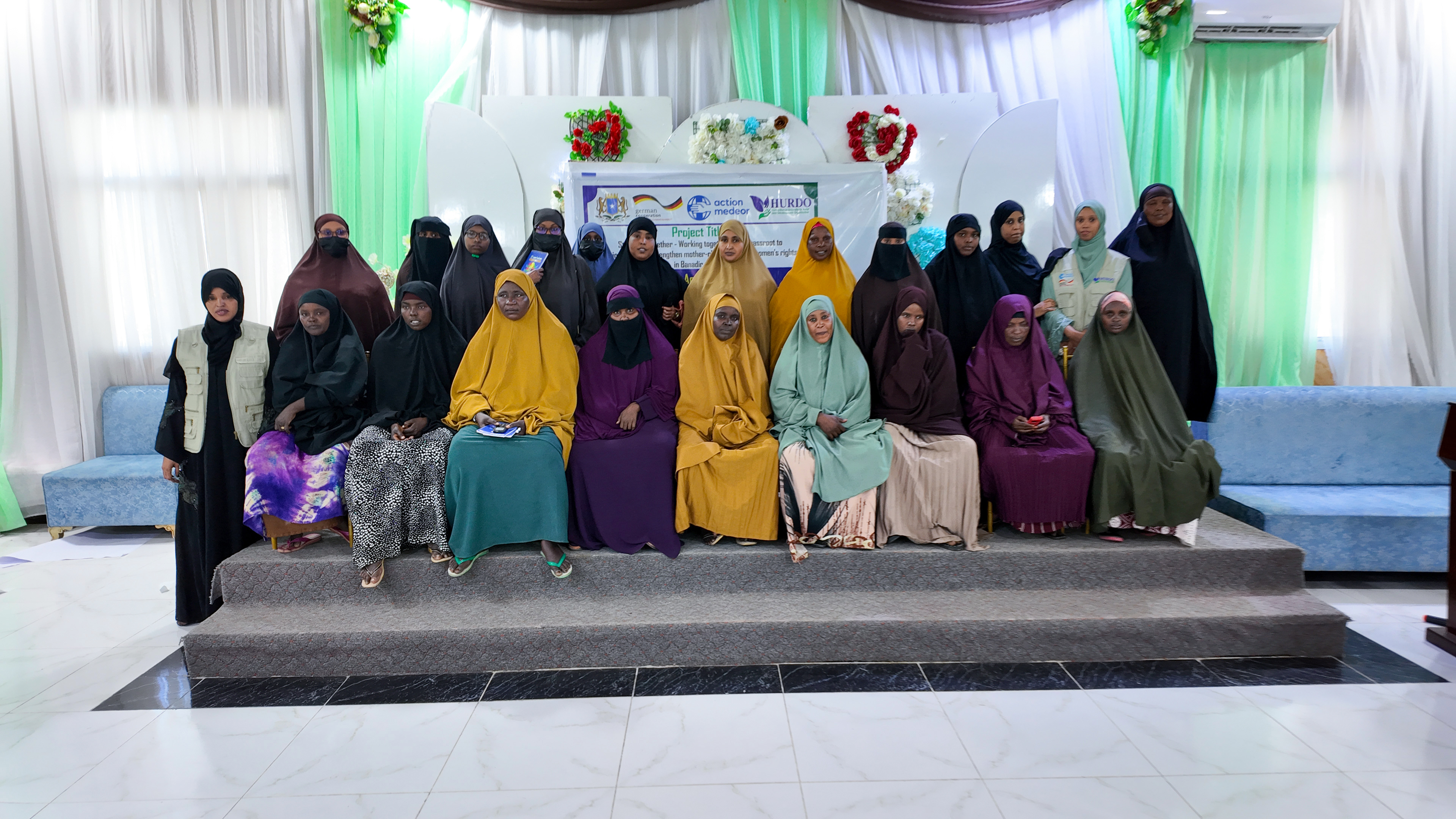 Women and HURDO staff at a women's rights training