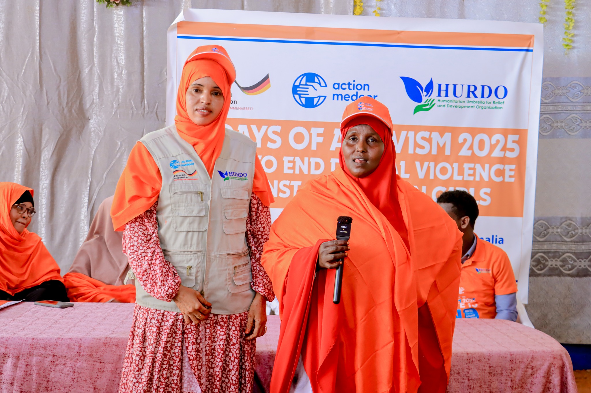 HURDO staff speaking at a 16 Days of Activism event